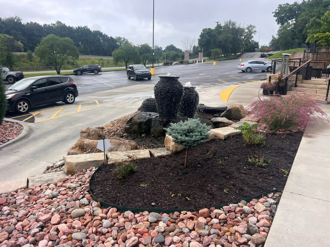 Commercial fountain installation with landscaping